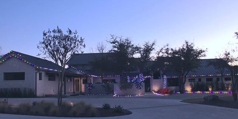 home decorated with holiday lights